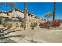 Elegant community sign amidst lush landscaping offers a welcoming first impression for Bella Vista residents and guests at 14000 N 94Th St # 3190, Scottsdale, AZ 85260