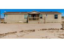 Exterior of the mobile home with front porch at 19954 W Teepee Rd, Buckeye, AZ 85326