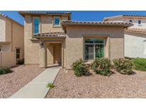 Charming single-Gathering home featuring desert landscaping, a tile roof, and a covered entry at 1926 W Busoni Pl, Phoenix, AZ 85023