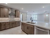 Spacious kitchen with stainless steel appliances and a large center island, perfect for cooking and entertaining at 2121 W Sonoran Desert Dr # 95, Phoenix, AZ 85085