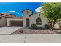 Charming single-story home with stucco exterior, tile roof, and low-maintenance desert landscaping at 3943 E Ficus Way, Gilbert, AZ 85298