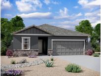 Charming single-story home featuring a two-car garage and professionally landscaped front yard at 4166 E Kolin Ln, San Tan Valley, AZ 85143