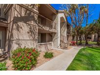 Inviting multi-level apartment with private balconies surrounded by lush landscaping and walkway at 17017 N 12Th St # 2012, Phoenix, AZ 85022