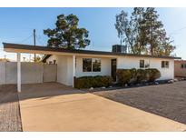 Charming single story home with a covered carport and low maintenance desert landscaping at 4147 W Cheery Lynn Rd, Phoenix, AZ 85019
