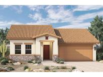 Charming single-story home showcasing a terracotta roof and a two-car garage on a sunny day at 19342 W San Juan Ave, Litchfield Park, AZ 85340