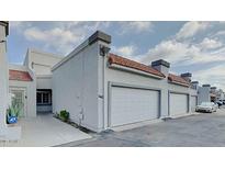 A single story home with a two car garage and a lovely red tiled roof at 4776 W Eva St, Glendale, AZ 85302