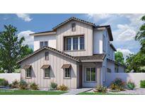 Charming two-story home with a farmhouse elevation and nicely landscaped front yard with colorful flowers at 2149 W Rowel Rd, Phoenix, AZ 85085