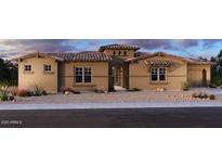 Charming single-story home with a low maintenance desert landscape, tile roof and neutral color palette at 13382 E Sand Hills Rd, Scottsdale, AZ 85255
