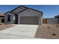 Charming single-story home featuring a spacious driveway and low-maintenance desert landscaping at 3945 E San Jose St, San Tan Valley, AZ 85143