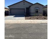 Charming single-story home with a two-car garage and desert landscaping at 4001 E San Jose St, San Tan Valley, AZ 85143