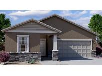 Charming single-story home with stone accents, neutral paint, manicured landscaping, and a two-car garage at 4131 E Kolin Ln, San Tan Valley, AZ 85143