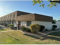 Charming townhome with well-maintained landscaping and a welcoming facade at 5080 N 83Rd St, Scottsdale, AZ 85250