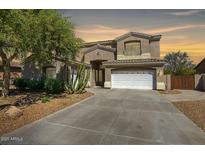 Beautiful two-story home with a private balcony, two-car garage, and desert landscaping in a quiet neighborhood at 2982 E Boston St, Gilbert, AZ 85295