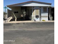 Charming single-story home with covered parking and desert landscaping at 3520 N Yucca Dr, Florence, AZ 85132