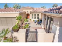 Covered courtyard with space for seating and desert landscaping in a quaint and private space at 23216 N Gaviota Dr, Sun City West, AZ 85375