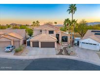 Beautiful home with a desert landscape, three-car garage, and classic desert architecture at 721 W Mountain Sky Ave, Phoenix, AZ 85045