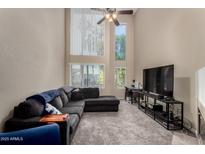 Bright living room featuring high ceilings, large windows, and a comfortable seating area at 3633 N 3Rd Ave # 2012, Phoenix, AZ 85013