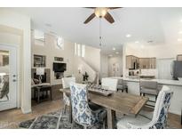 Open-concept dining area flows seamlessly into the kitchen, creating an inviting space for meals and gatherings at 7445 E Eagle Crest Dr # 1122, Mesa, AZ 85207