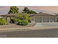 Charming single-story home featuring a two-car garage and low-maintenance desert landscaping at 1508 W Kiowa Ave, Mesa, AZ 85202