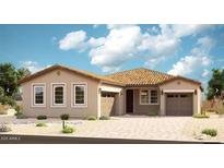 Charming single-story home featuring a terracotta roof, neutral stucco, desert landscaping, and a two-car garage at 21846 E Bonanza Ct, Queen Creek, AZ 85142