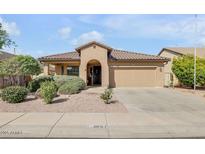 Charming single-story home featuring desert landscaping and a tile roof at 2857 N Mystic Ct, Casa Grande, AZ 85122