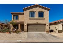 Charming two-story home with a two-car garage, covered entry, and desert landscaping at 1472 E Avenida Kino --, Casa Grande, AZ 85122