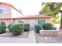 Charming single-story home featuring desert landscaping and a welcoming walkway leading to the front door at 17620 N 17Th Pl # 36, Phoenix, AZ 85022