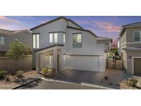 Beautiful two-story home featuring a two car garage and a low maintenance front yard at 15837 N 74Th Ln, Peoria, AZ 85382
