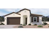 Charming single-story home with a two-car garage, neutral-toned exterior, and desert landscaping at 22819 E Lords Way, Queen Creek, AZ 85142