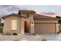 Charming single-story home featuring a tile roof, red door, and low maintenance desert landscaping at 24161 W Hilton Ave, Buckeye, AZ 85326