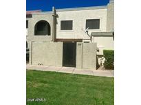 Inviting townhouse featuring a private courtyard and low-maintenance front yard, perfect for easy living at 4828 W Rancho Dr, Glendale, AZ 85301