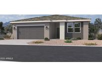 Charming single-story home with a two-car garage and desert landscaping at 5551 S 240Th Ln, Buckeye, AZ 85326