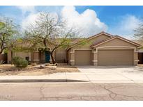 Charming single-story home featuring a two-car garage and well-maintained front yard at 1425 E Darrel Rd, Phoenix, AZ 85042