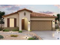 Charming single-story home featuring a tile roof, a two-car garage, and desert landscaping at 1339 S 215Th Dr, Buckeye, AZ 85326