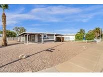 Charming home with covered parking and low-maintenance desert landscaping at 848 W Calle Del Norte --, Chandler, AZ 85225