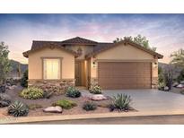 Charming home featuring a desert landscaped yard and a two car garage at 21296 N 270Th Dr, Buckeye, AZ 85396