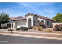 Charming single-story home featuring desert landscaping, a two-car garage, and a covered entry way at 4094 E Los Altos Dr, Gilbert, AZ 85297