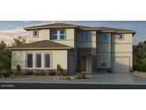 Beautiful two-story home featuring stone accents, manicured landscaping and a two car garage at 17827 W Medlock Dr, Litchfield Park, AZ 85340