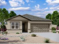 Charming single-story home featuring a neutral-toned exterior, a two-car garage, and low-maintenance desert landscaping at 13198 E Verbina Ln, Florence, AZ 85132