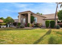 Charming home featuring a well-manicured lawn and desert landscaping at 851 N Citrus Cove --, Mesa, AZ 85213