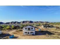 A home under construction with mountain views at 3835 W Fox Rd, Laveen, AZ 85339
