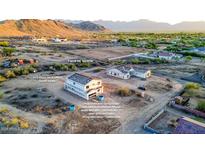 Exterior view of a home with spray foam insulation, 2nd story deck and mountain views at 3835 W Fox Rd, Laveen, AZ 85339