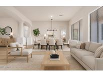 Bright and airy living room featuring hardwood floors, large windows, and an open floor plan at 1112 E Winged Foot Dr, Chandler, AZ 85249