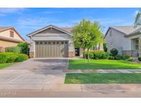 Charming single-Gathering home featuring a well-maintained lawn and a spacious two-car garage at 3504 E Pinto Dr, Gilbert, AZ 85296