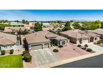 A charming single-Gathering home featuring a well-maintained yard and a two-car garage in a suburban neighborhood at 2476 E Marlene Dr, Gilbert, AZ 85296