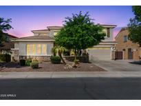 Charming two-story home with a well-manicured front yard and desert landscaping at 4340 S Marble St, Gilbert, AZ 85297