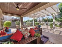 Comfortable outdoor seating on a covered patio, perfect for relaxing and entertaining at 4340 S Marble St, Gilbert, AZ 85297