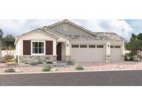Charming single-story home featuring a two-car garage, stone accents, and desert landscaping at 12366 W Marguerite Ave, Avondale, AZ 85323