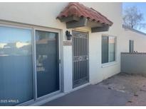 Inviting front entrance with secure door and tile roof at 14414 N Boxwood Ln, Fountain Hills, AZ 85268