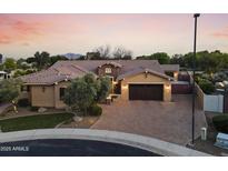 Stunning single-story home boasts tile roof, mature landscaping, and a spacious driveway at 3381 E Azalea Dr, Chandler, AZ 85286